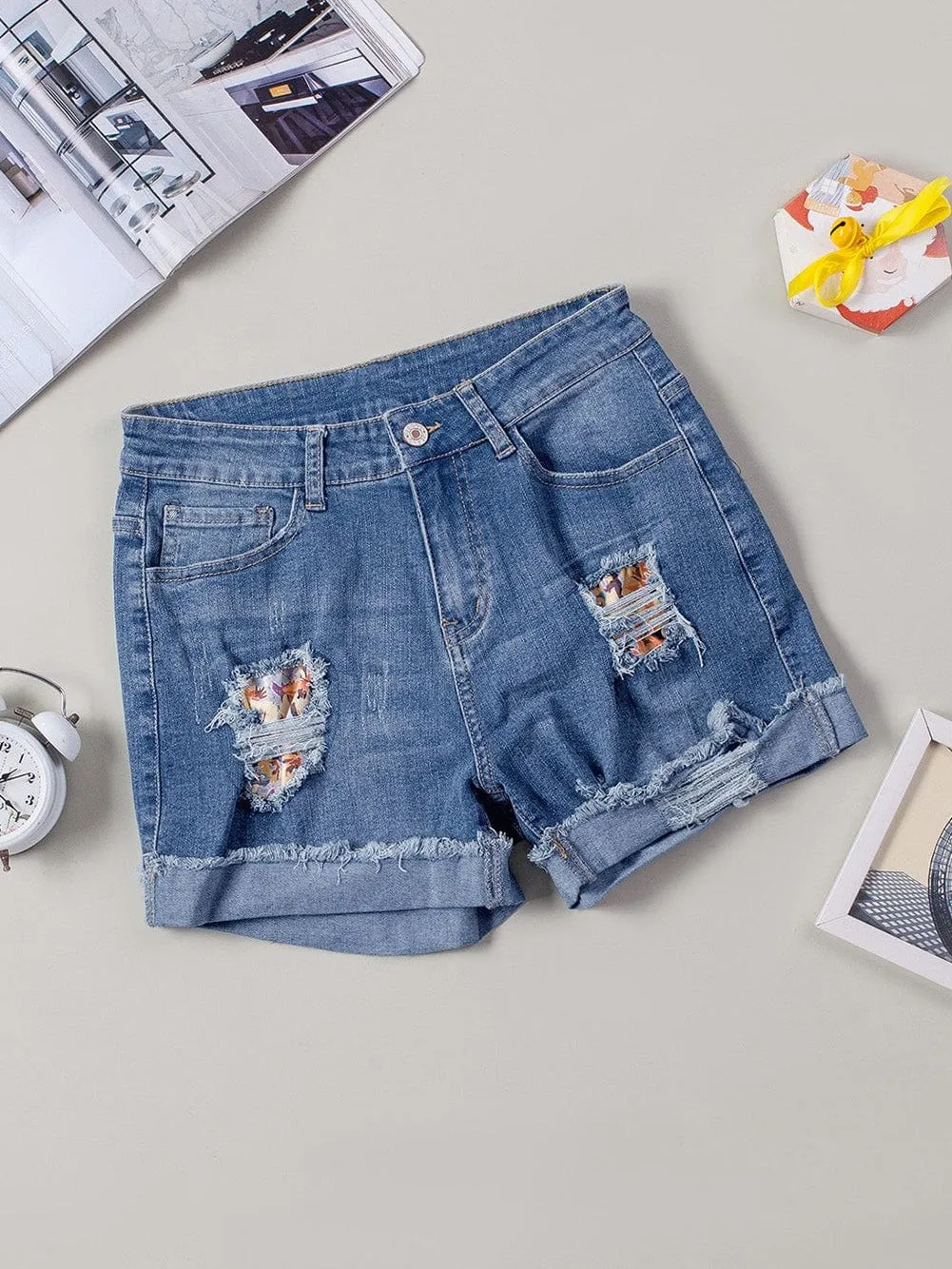 Bohemian Style Ripped Denim Shorts with Floral Accents