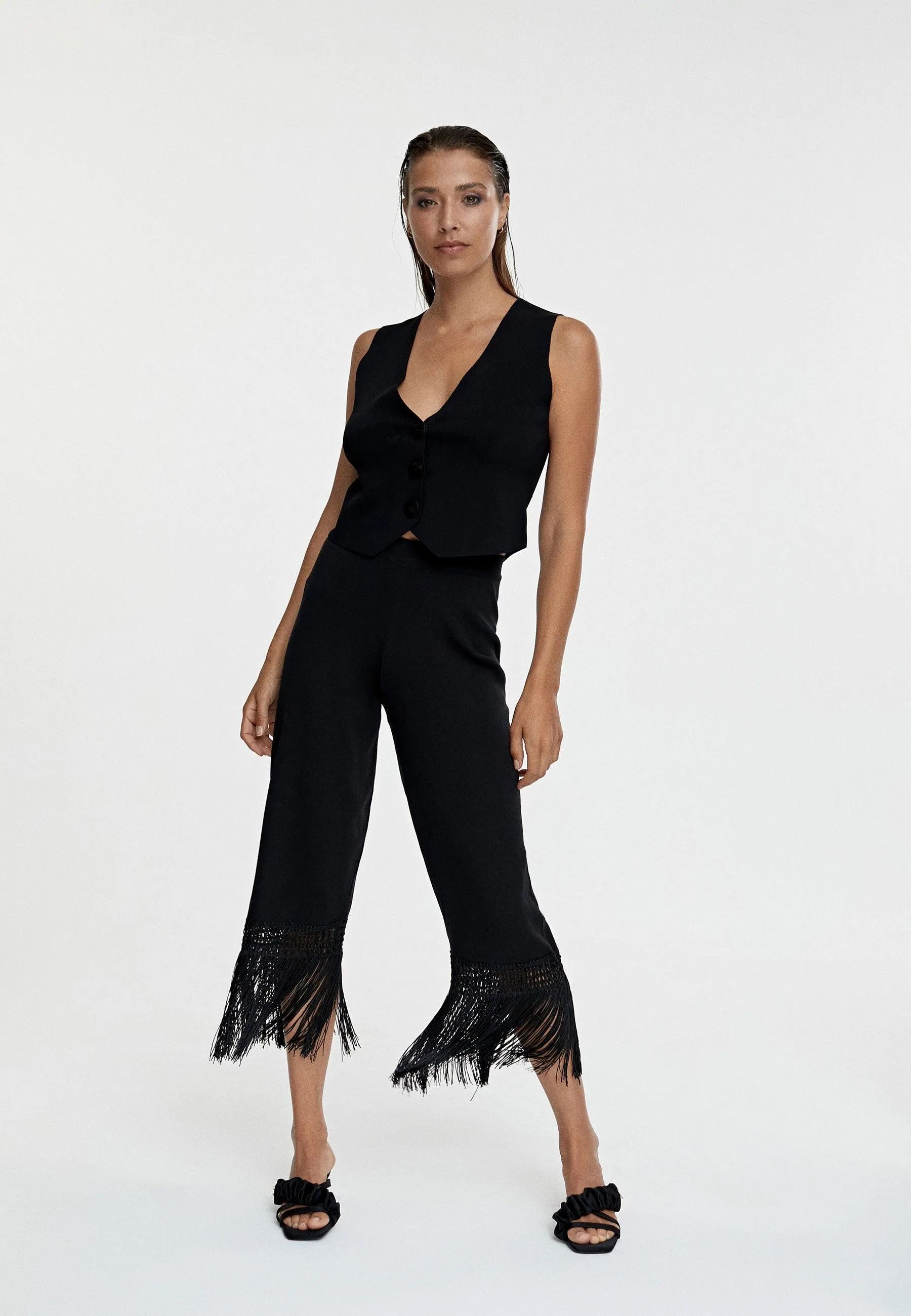 Fringed knit trousers