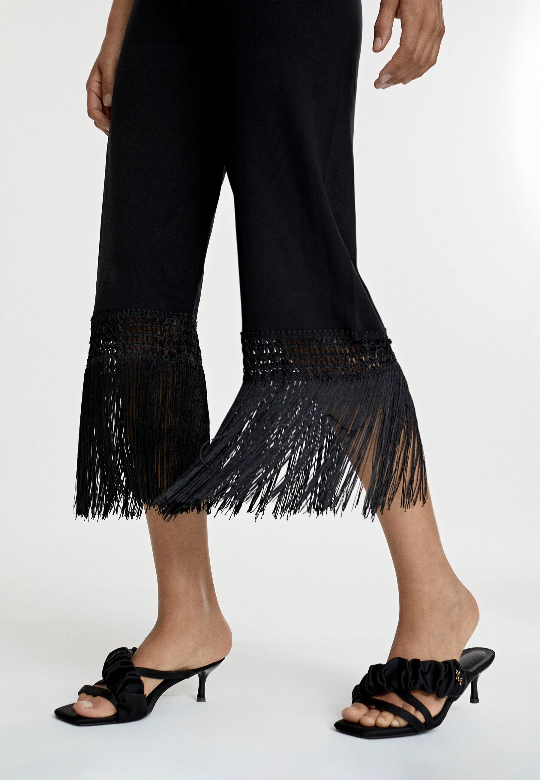 Fringed knit trousers